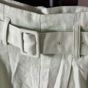Pastel green linen high waisted shorts